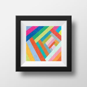 Framed abstract giclée print with bold diagonal rainbow stripes and colorful geometric blocks